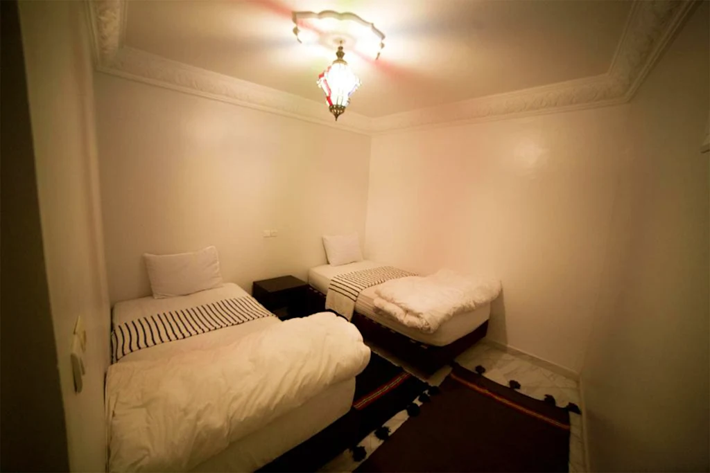 Two-bedroom room with shared bathroom